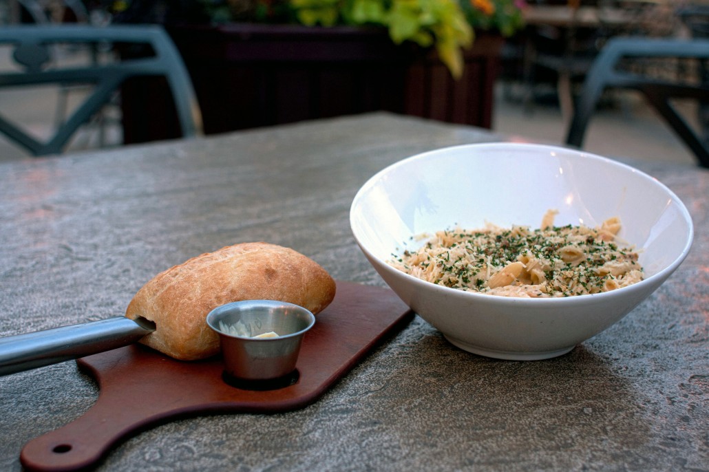 HDR commercial food photograph of a plated dish on a restaurant patio table